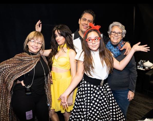 Alejandro Cabello, with his mother, wife, and daughters.